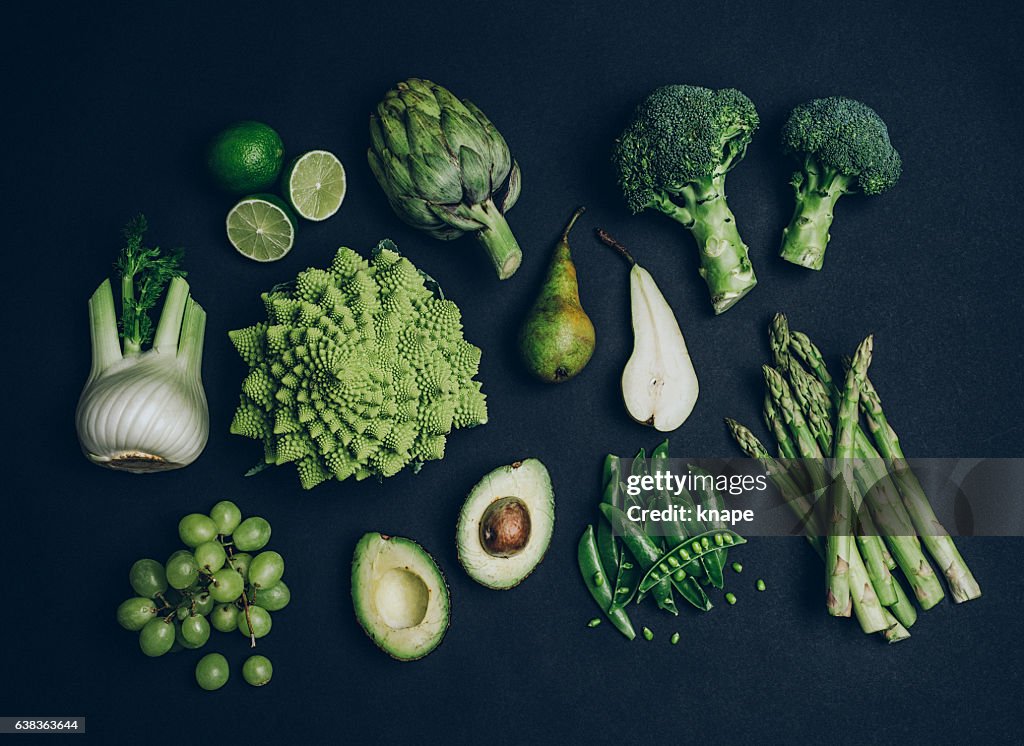 Green vegetables shoot from above over head