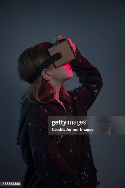 girl using virtual reality headset. - vr kids stock pictures, royalty-free photos & images