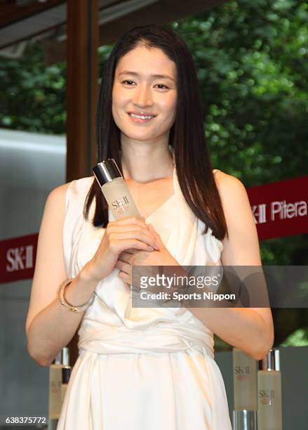 Actress Koyuki attends Max Factor Sk-2 promotional event on July 1, 2013 in Tokyo, Japan.