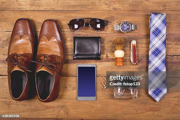 men's accessories organized on table in knolling arrangement - 都會型男 個照片及圖片檔