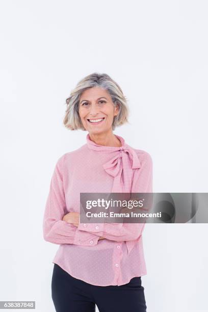 happy woman posing in pink blouse - pink blouse foto e immagini stock