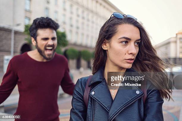 losing temper - cruel stock pictures, royalty-free photos & images