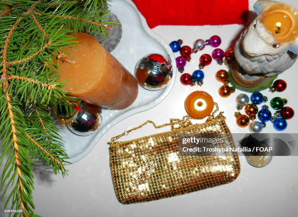Handbag with candle and Christmas bauble