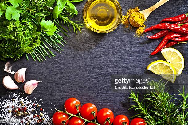 cooking and seasoning ingredients border - bowl chili peppers bildbanksfoton och bilder