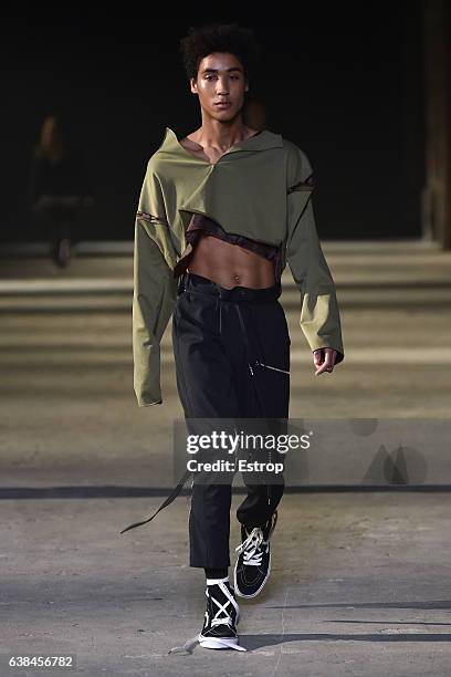 Model walks the runway at Sulvam Show during Pitti Uomo 91 on January 12, 2017 in Florence, Italy.