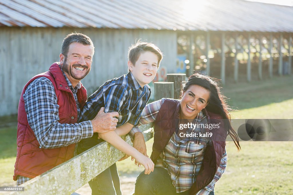 Family with teenage son on a farm