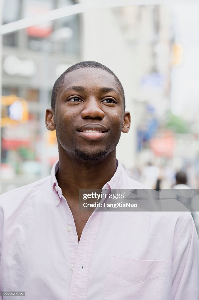 Portrait of young Black man in downtown city