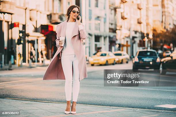 beautiful elegant woman talking on the phone - coffee car design stock pictures, royalty-free photos & images