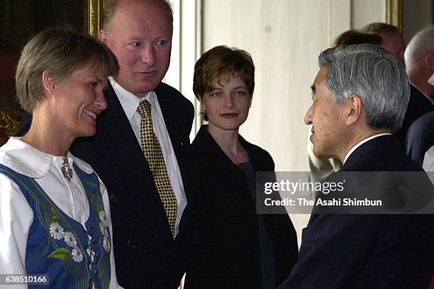 Emperor Akihito talks to a staff during his visit Gripsholm Castle on May 31, 2000 in Mariefred, Sweden.
