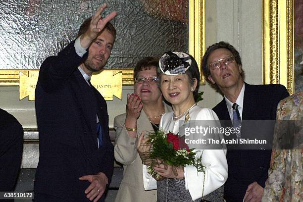 Empress Michiko talks to a staff during his visit Gripsholm Castle on May 31, 2000 in Mariefred, Sweden.
