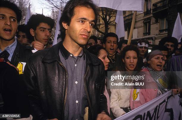 French singer Jean-Jacques Goldman attends SOS Racisme demonstration to protest against hate crimes in France on March 15, 1990 in Paris, France.