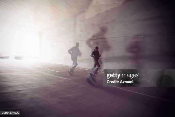 dedicated to running - double exposure running stock pictures, royalty-free photos & images