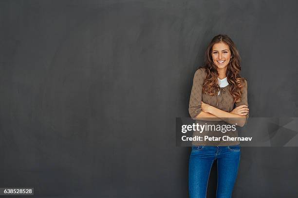 beautiful woman with blackboard copy space - teacher portrait stock pictures, royalty-free photos & images