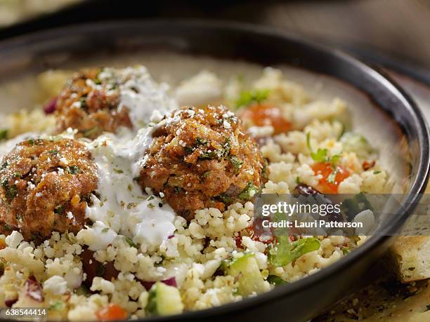 lamb meatballs with a couscous greek salad and tzatziki - greek yogurt stock pictures, royalty-free photos & images