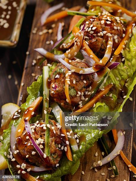 asian inspired meatball lettuce wrap - meatball sandwich stock pictures, royalty-free photos & images