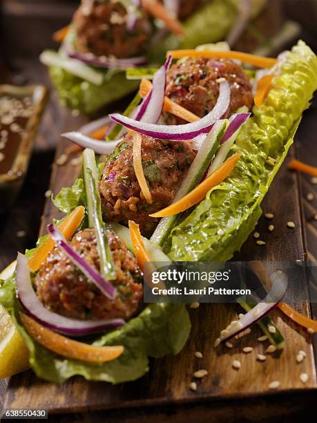 asian inspired meatball lettuce wrap - low carb diet stock pictures, royalty-free photos & images