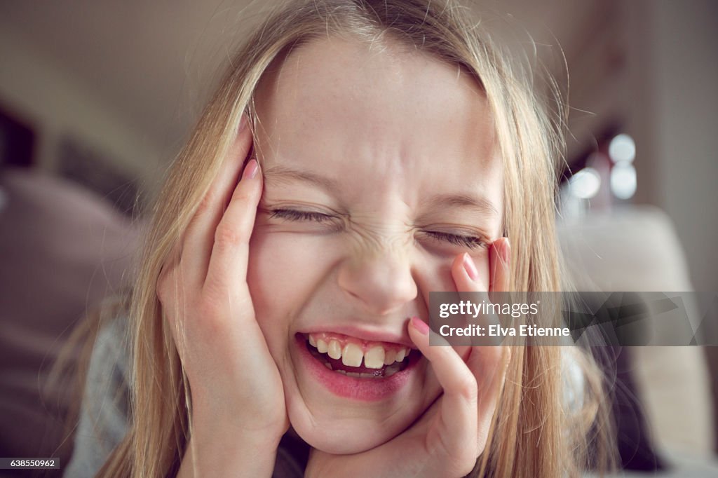Laughing girl (9-10)