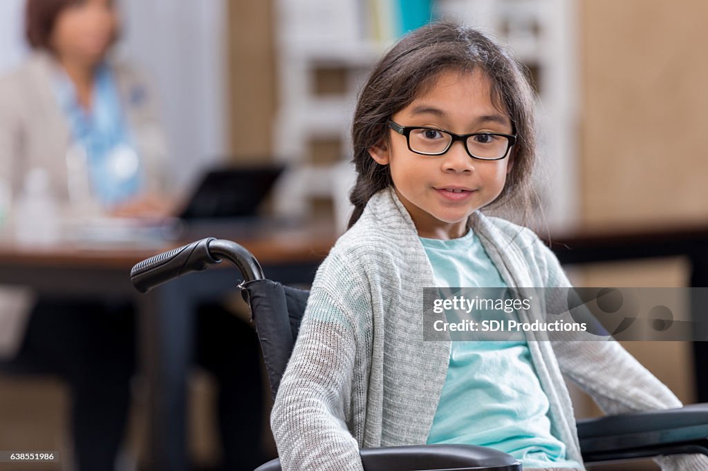 Young female patient in wheelchair