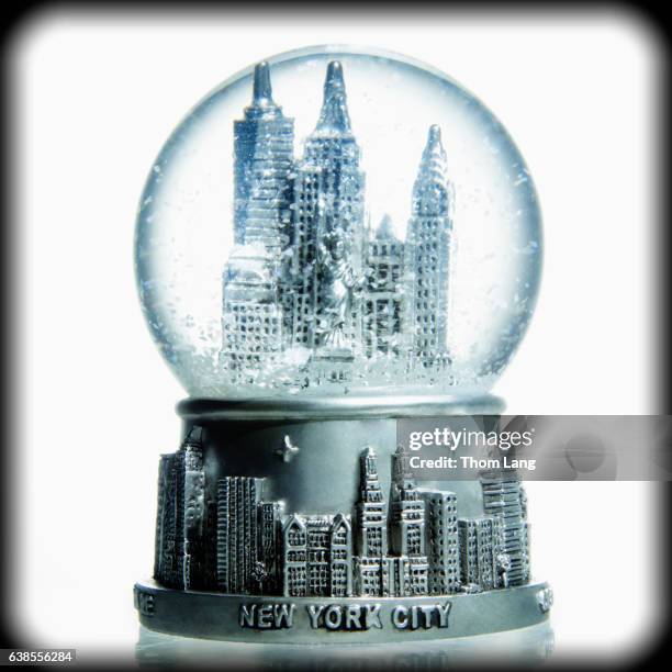 new york city in a bubble globe - snow globe stock-fotos und bilder