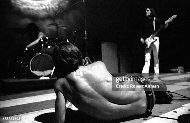 Singer Iggy Pop, drummer Scott Asheton and guitarist Ron Asheton of Iggy And The Stooges perform onstage at the Fillmore West on May 15, 1970 in San...