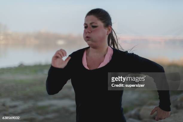 jogging for fun - tired runner stock pictures, royalty-free photos & images
