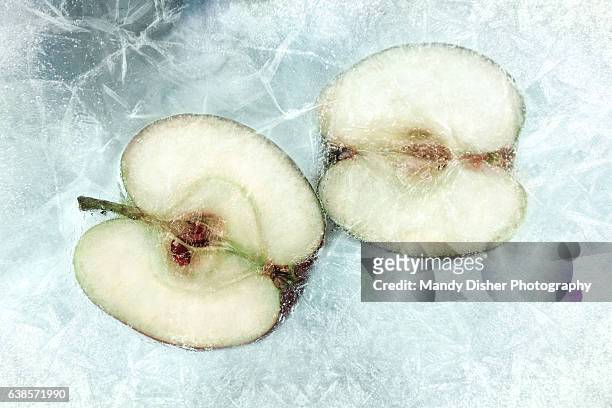 frozen apple - frozen fruit stock pictures, royalty-free photos & images