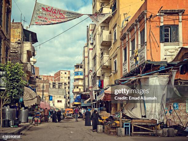 view of local market in a backstreet of alexandria, egypt - alexandria egypt fotografías e imágenes de stock