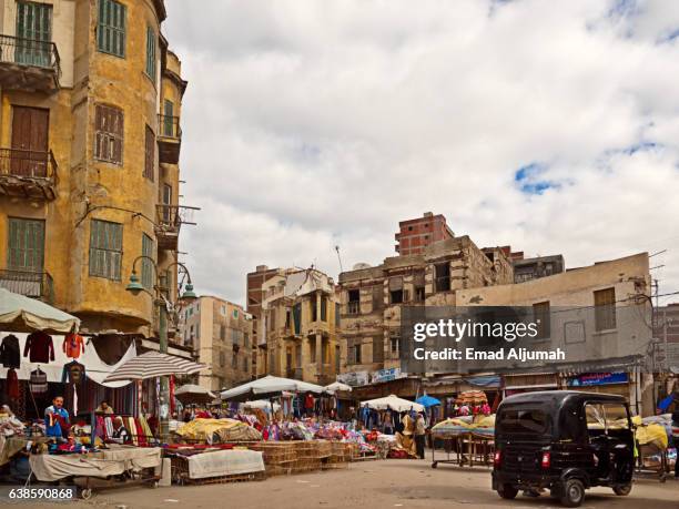 view of local market in a backstreet of alexandria, egypt - alexandria stock pictures, royalty-free photos & images