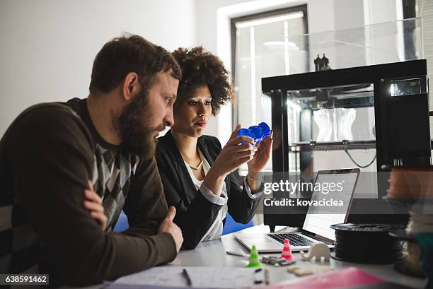 let's see if this is okay - 3d printer female stockfoto's en -beelden