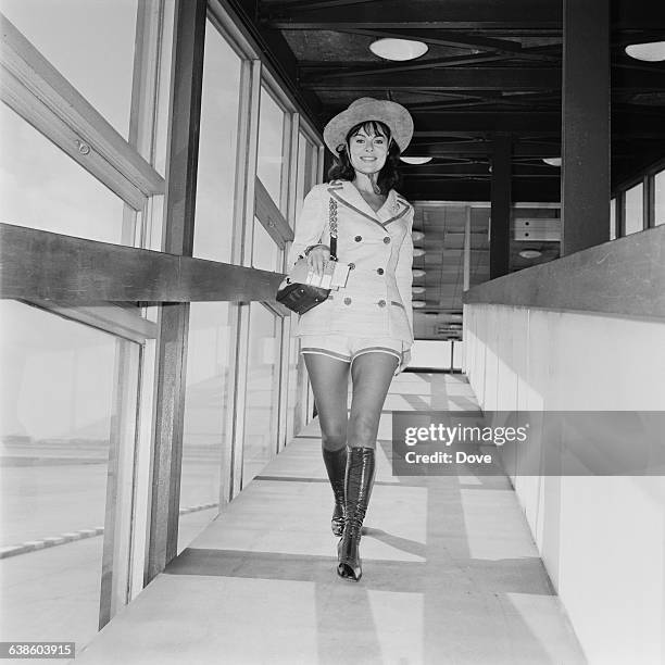 British actress Anne Heywood in hot pants at London Airport, UK, 8th May 1971.