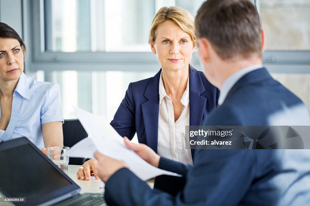 Senior businesswoman during a staff meeting