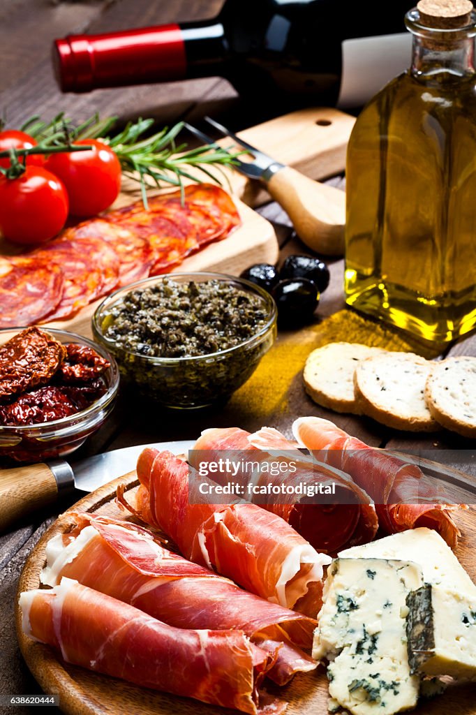 Delicious appetizer on rustic wood table