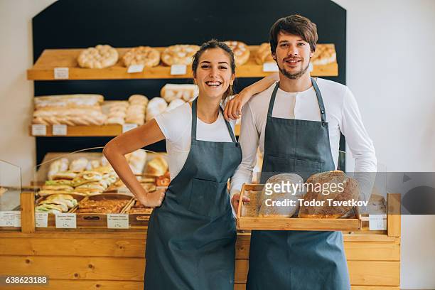 young bakers - bakery apron bildbanksfoton och bilder