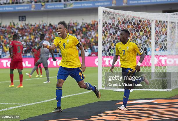 Pierre Emerick Aubamayang celebrates scoring for Gabon during the Group A match between Gabon v Guinea-Bissau at Stade de L'Amitie on January 14,...
