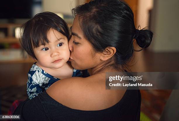 mother loves her baby - multi racial - asian toddler stock pictures, royalty-free photos & images