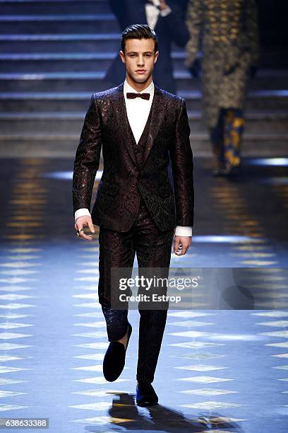 Blogger Cameron Dallas walks the runway at the Dolce & Gabbana show during Milan Men's Fashion Week Fall/Winter 2017/18 on January 14, 2017 in Milan,...