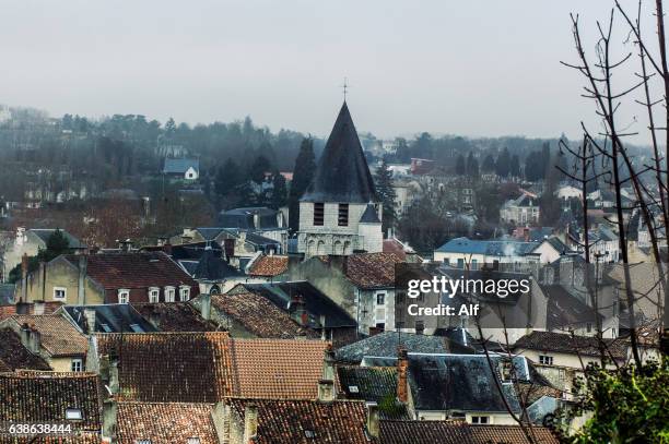 view of the bell tower of the notre-dame church in chauvigny, france - chauvigny fotografías e imágenes de stock