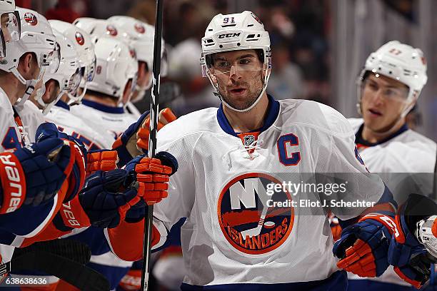 John Tavares of the New York Islanders celebrates his first goal of the game with teammate during the first period against the Florida Panther at the...