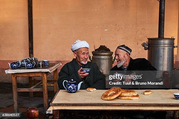 uzbekistan, fergana, traditional tea house - uzbekistan stock pictures, royalty-free photos & images