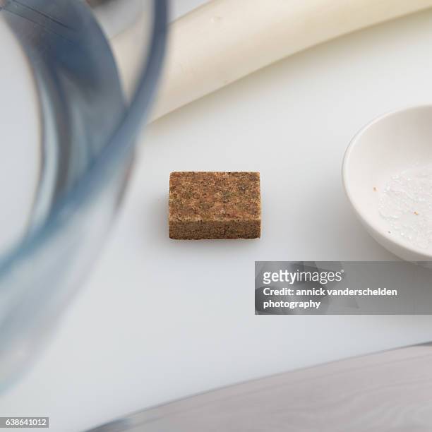 vegetable bouillon cube. - bouillon stock pictures, royalty-free photos & images