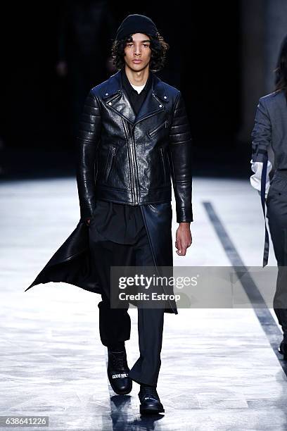 Model walks the runway at the Neil Barrett show during Milan Men's Fashion Week Fall/Winter 2017/18 on January 14, 2017 in Milan, Italy.