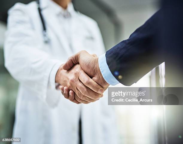 health is wealth - business agreement stock pictures, royalty-free photos & images