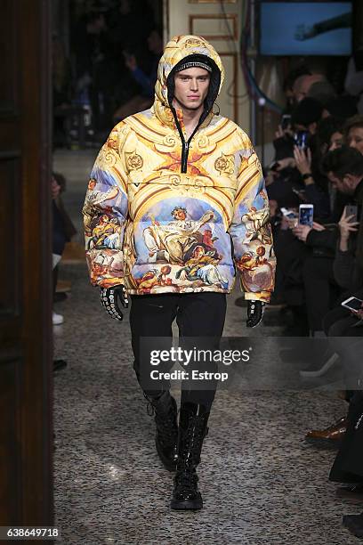 Matthew Noszka walks the runway at the Moschino designed by Jeremy Scott show during Milan Men's Fashion Week Fall/Winter 2017/18 on January 14, 2017...