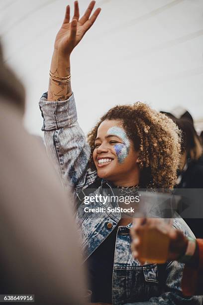 hands in the air like you don't care - festival make up stock pictures, royalty-free photos & images