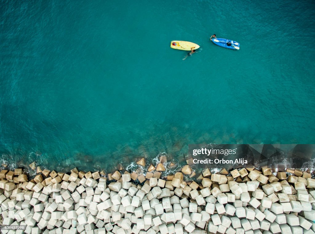 Two men with surfboards