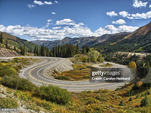 hairpin turn on highway 550 known as the million dollar highway between ouray & silverton in the rocky mountains - million dollar highway stock-fotos und bilder