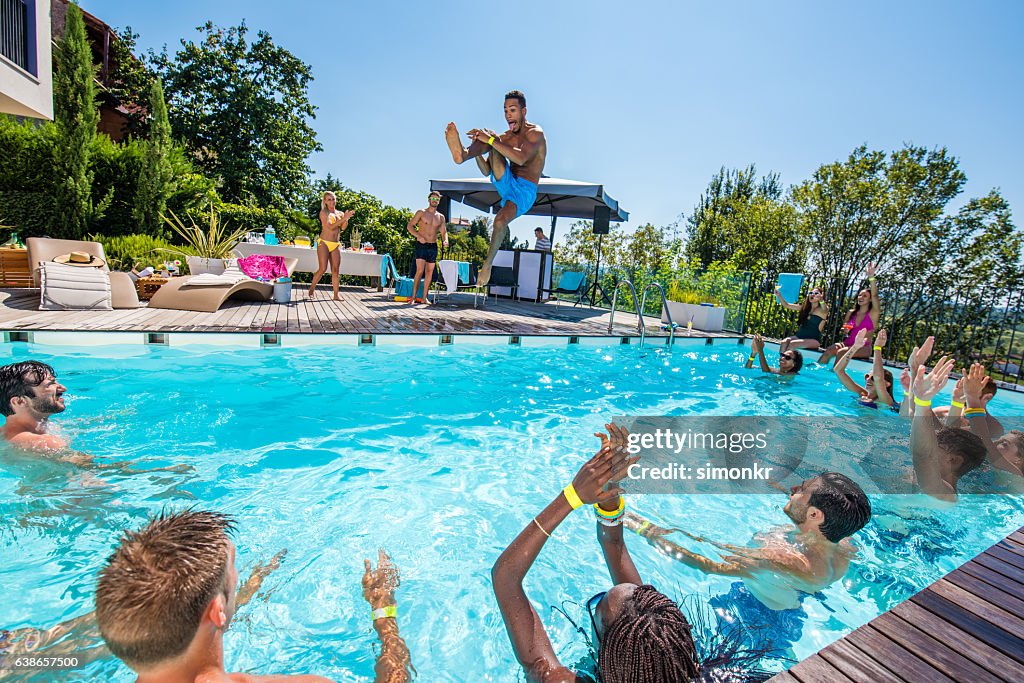Young Man Diving Into Pool High-Res Stock Photo - Getty Images