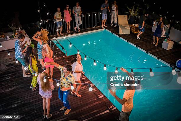 friends enjoying pool party - poolparty bildbanksfoton och bilder