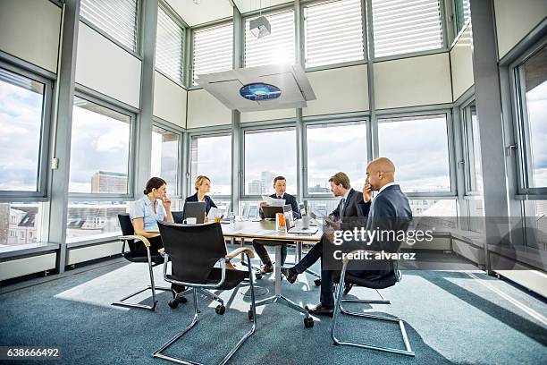 business colleagues meeting in conference room - styrelse bildbanksfoton och bilder