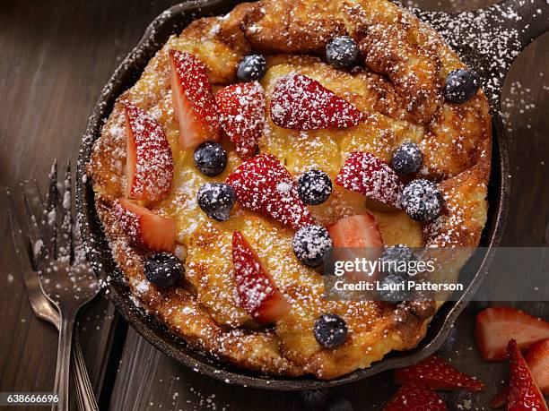 sweet berry skillet, dutch baby pancake - danish pastry stock pictures, royalty-free photos & images